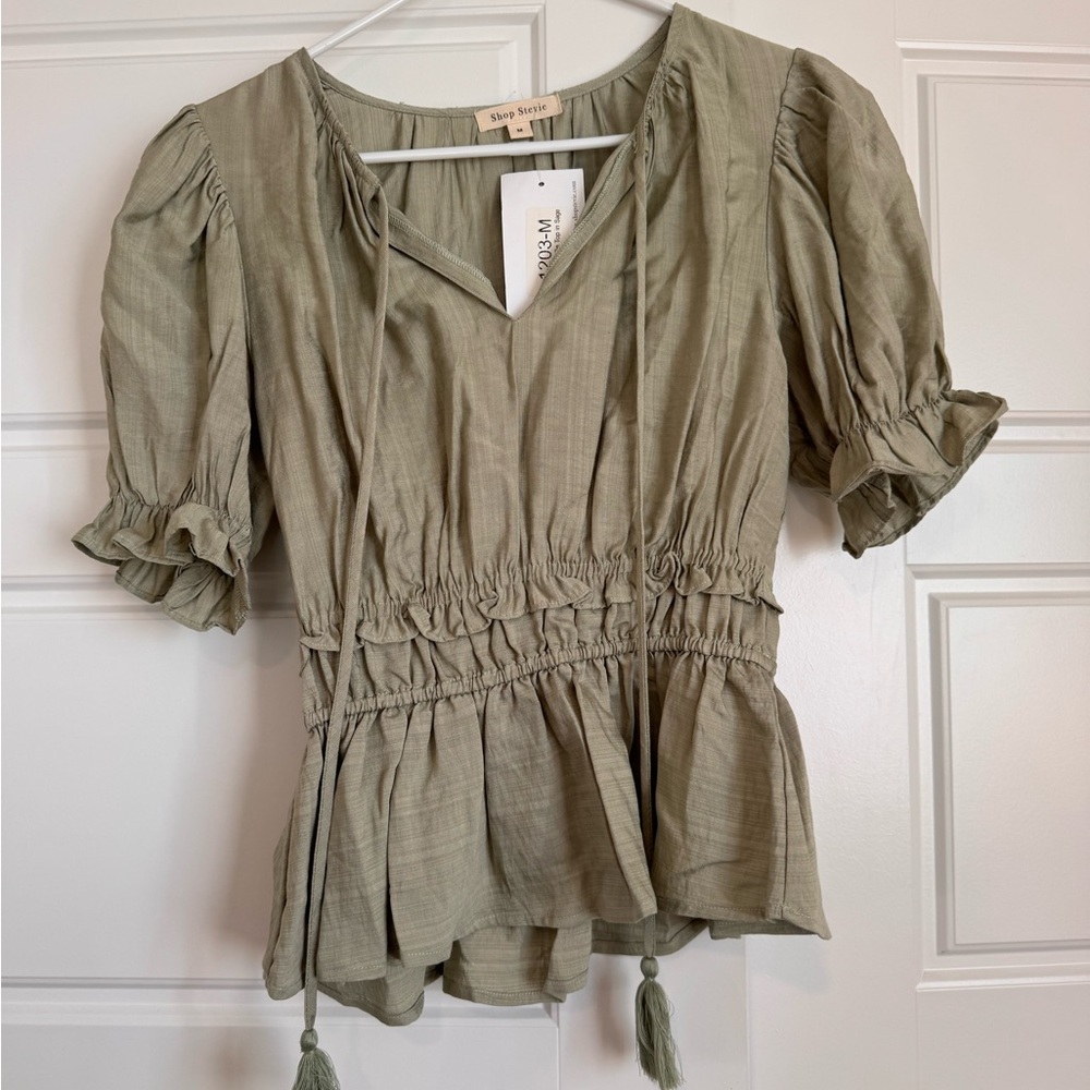 Shop Stevie Olive Peplum Blouse